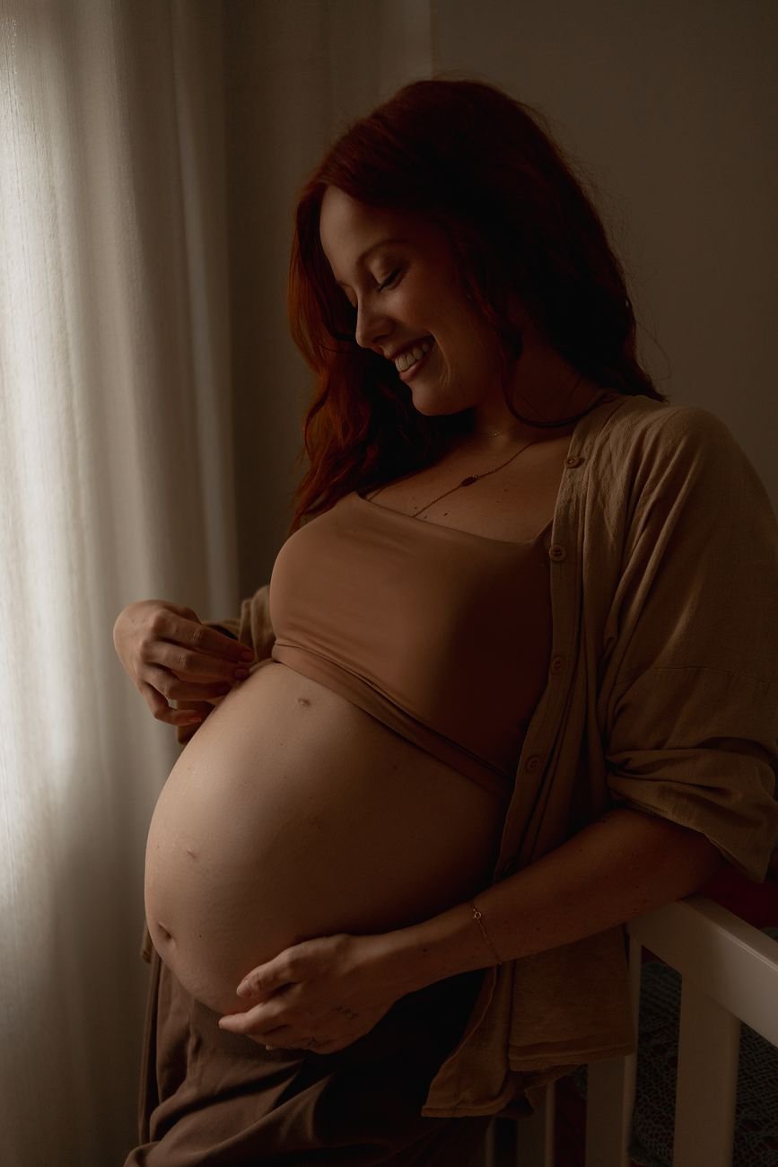 Portrait of a smiling mother in warm soft lighting